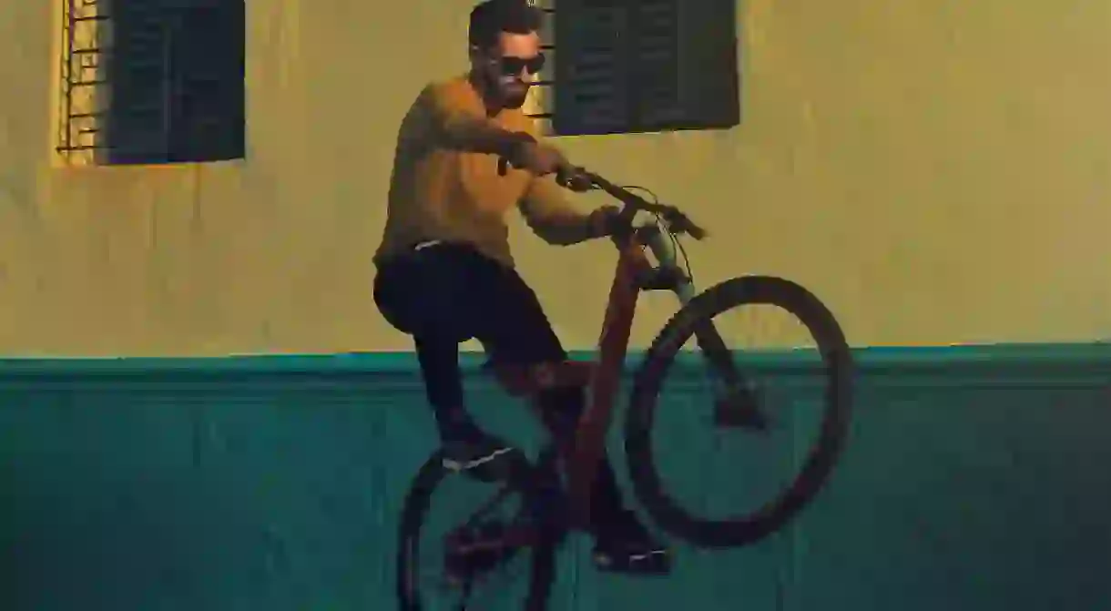 Trendy guy on a bike