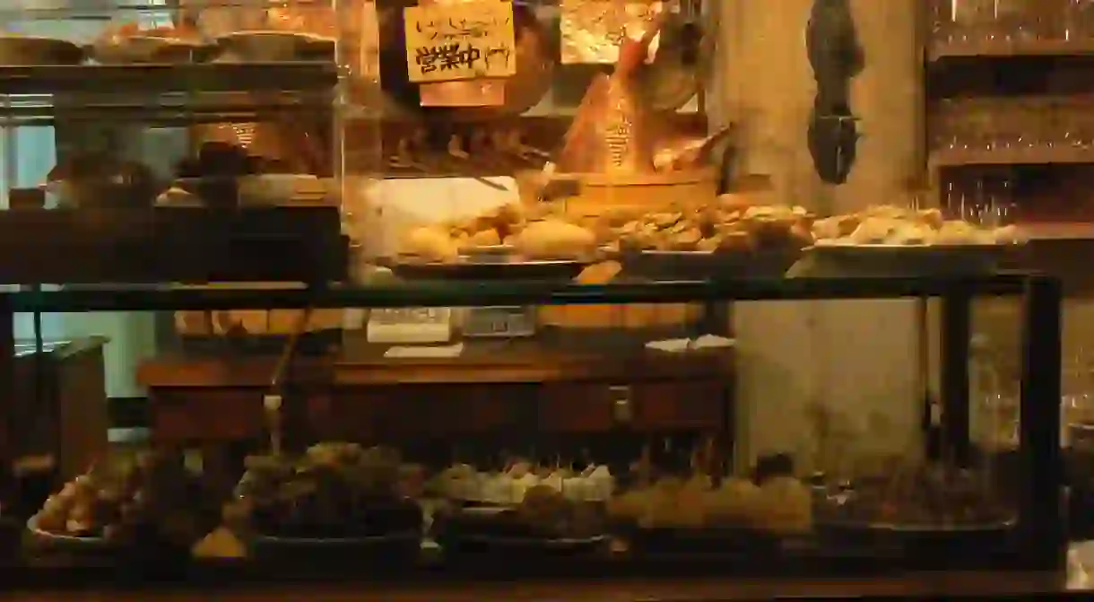 A well-stocked counter at Cantina Do Mori