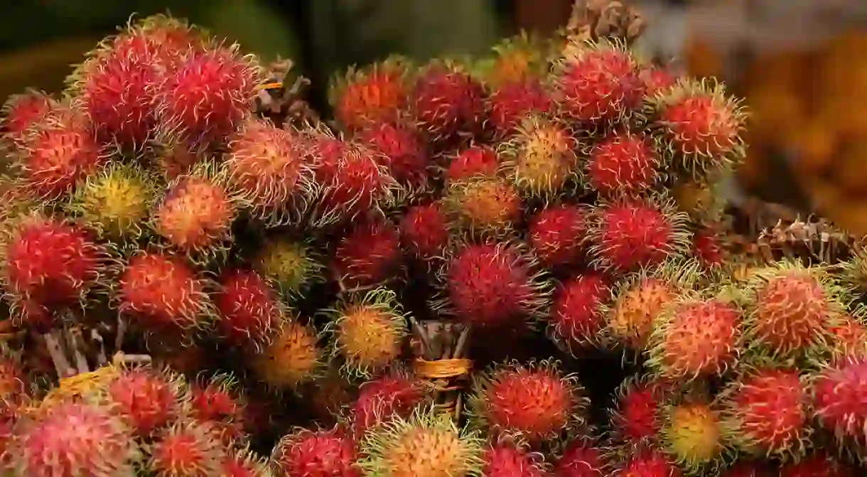 Rambutans for sale by the bunch at Chow Kit Market