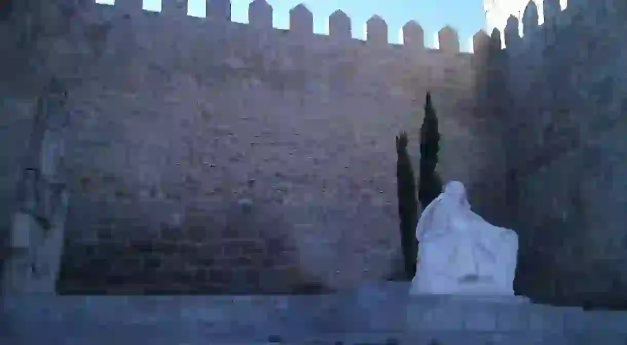 A statue of Saint Teresa outside the walls of Ávila