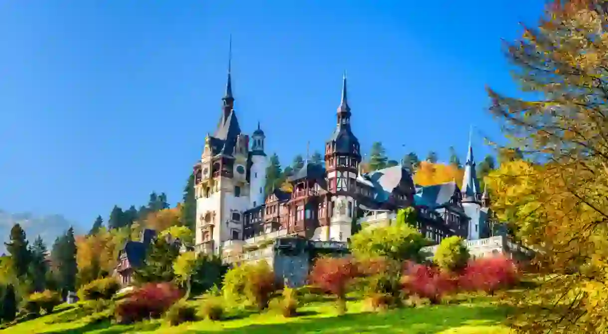 Peles Castle, Romania. Beautiful famous royal castle and ornamental garden in Sinaia landmark of Carpathian Mountains in Europe