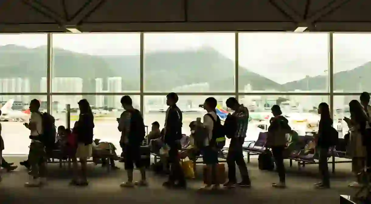 People waiting to board a plane