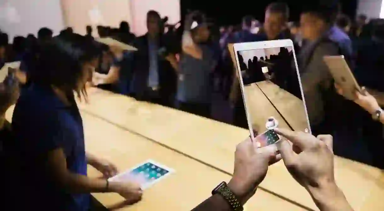 Attendees of WWDC try out the new ARKit, bringing high-quality AR experiences to iPhone and iPad.