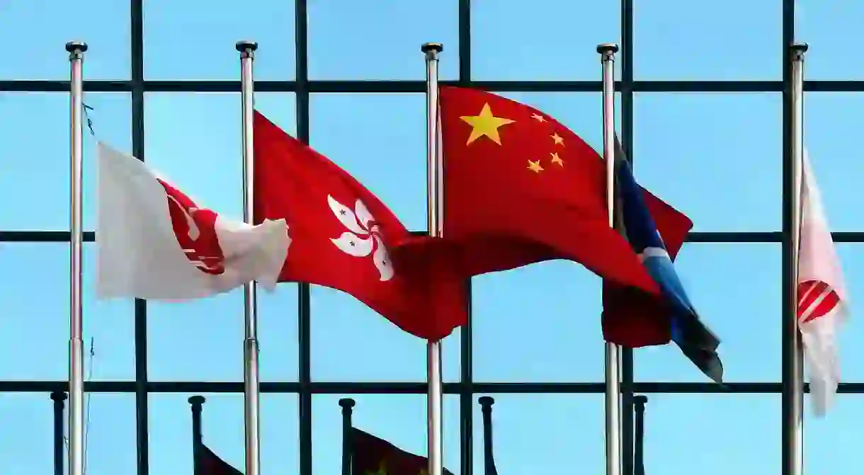 Flags of Hong Kong and the People’s Republic of China