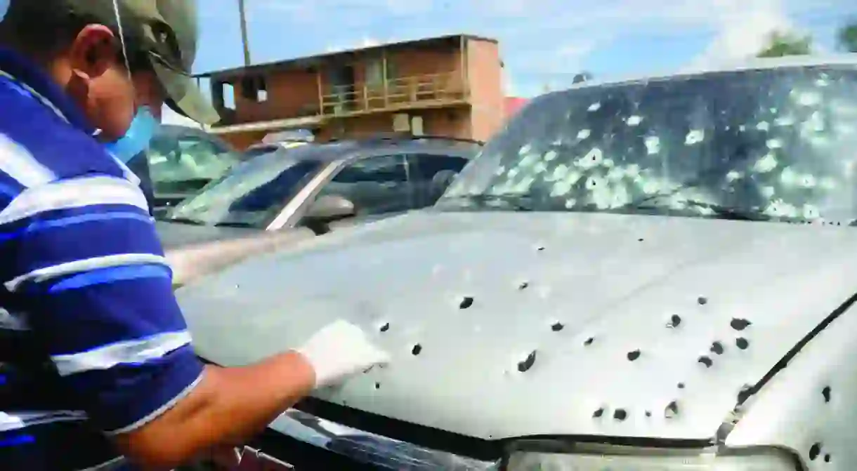 Drug violence in Mexico. This is the bullet ridden, drug-related hit remains of a car in Hermosillo, Sonora