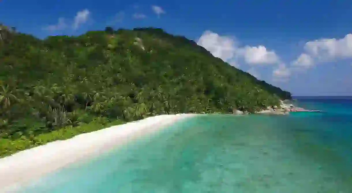 Pristine white sands of Grand Anse Beach