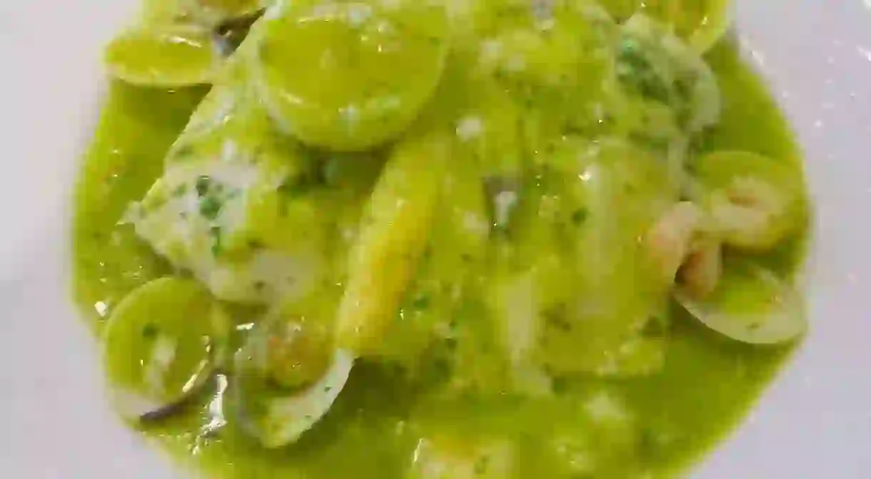 Hake fish in green sauce (Basque cuisine)