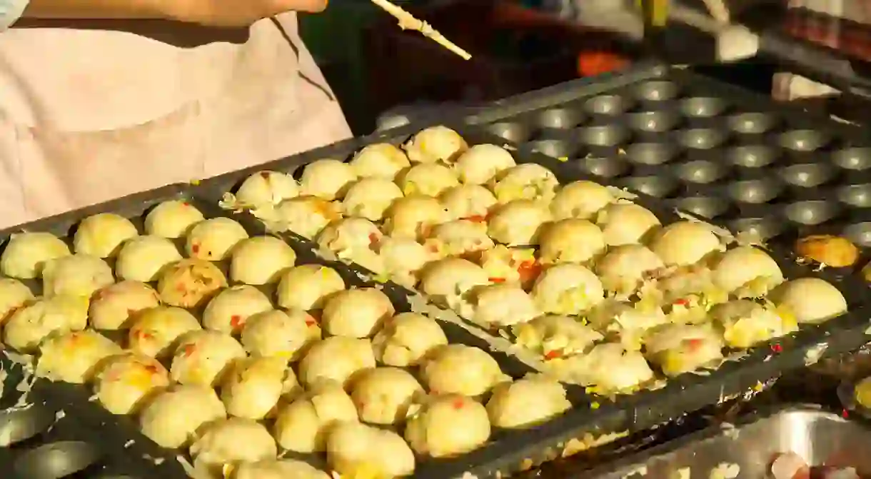 Making takoyaki.