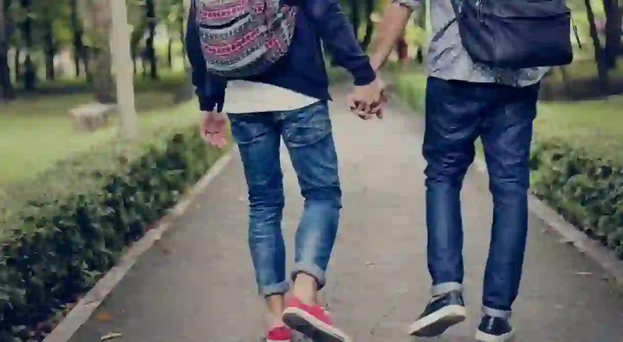 Couple holding hands