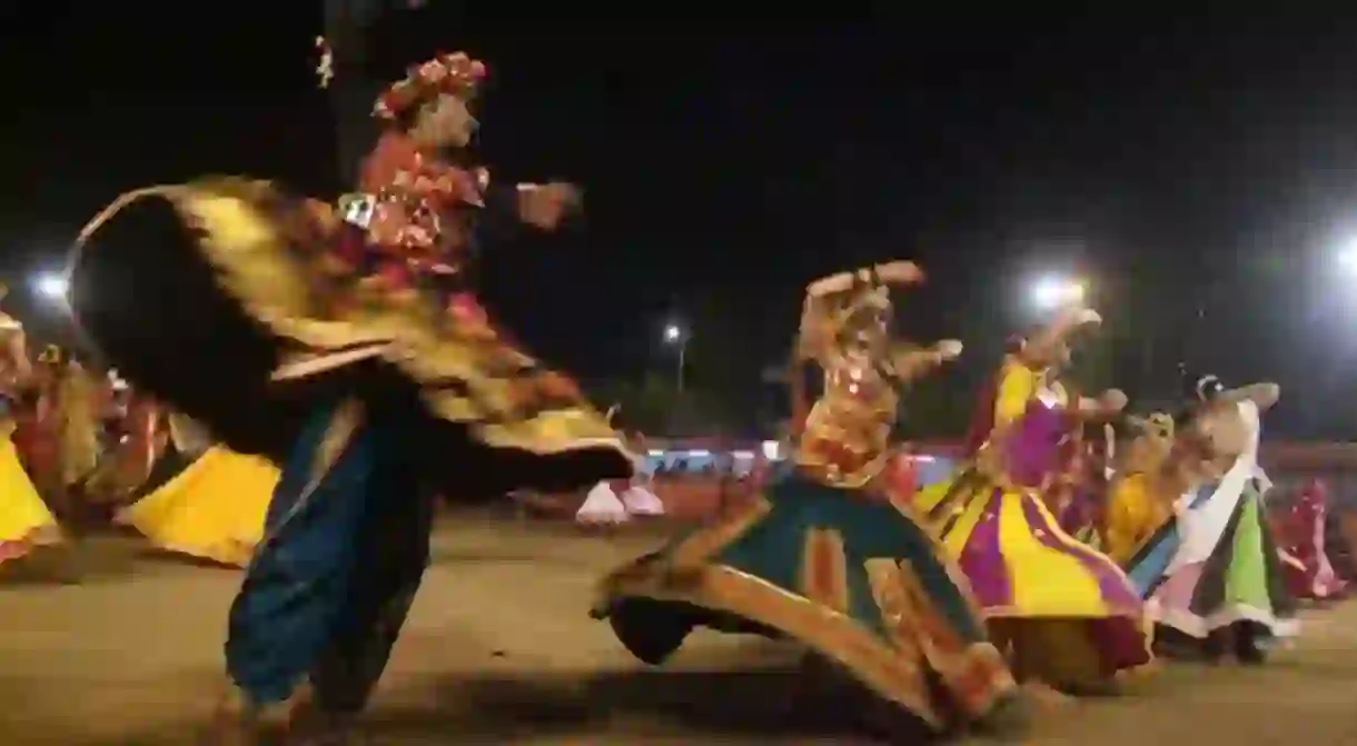 People dressed up in ethnic Gujarati costumes and performing Navratri Garba in Ahmedabad