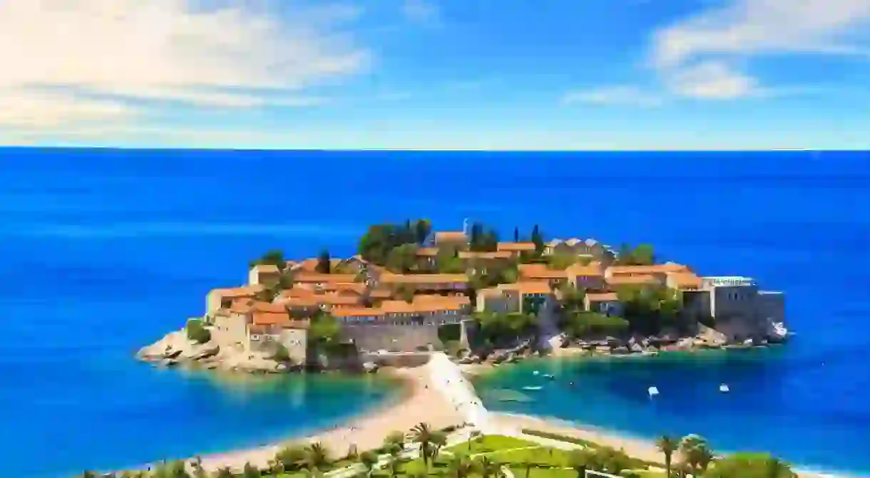 Beautiful view of the island-resort of St. Stefan (Sveti Stefan) on the Budva Riviera, Budva, Montenegro on a sunny day