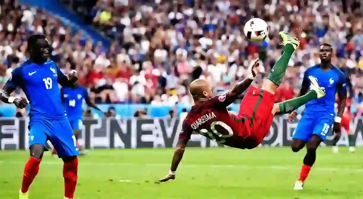 Ricardo Quaresma performing a bicycle kick against France at Euro 2016 final │