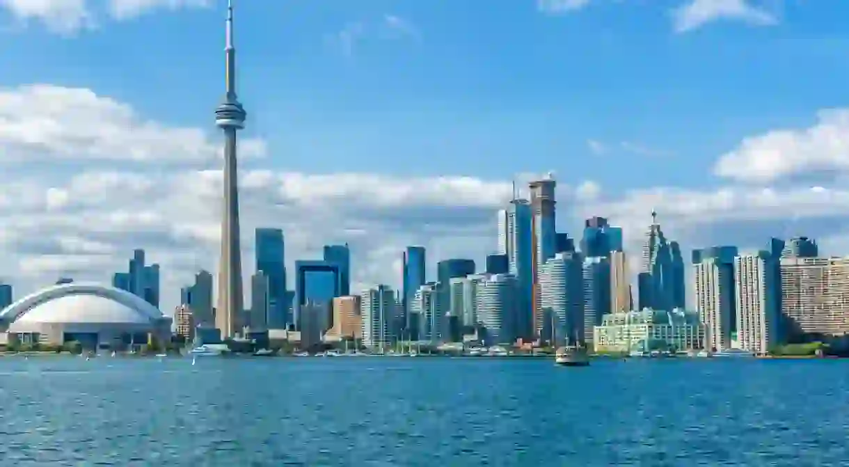 The beautiful Torontos skyline over Lake Ontario. Urban architecture. Ontario, Canada