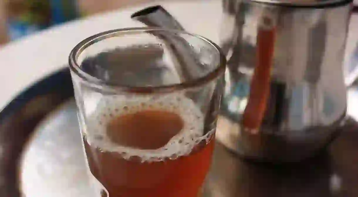 Glass of freshly poured mint tea