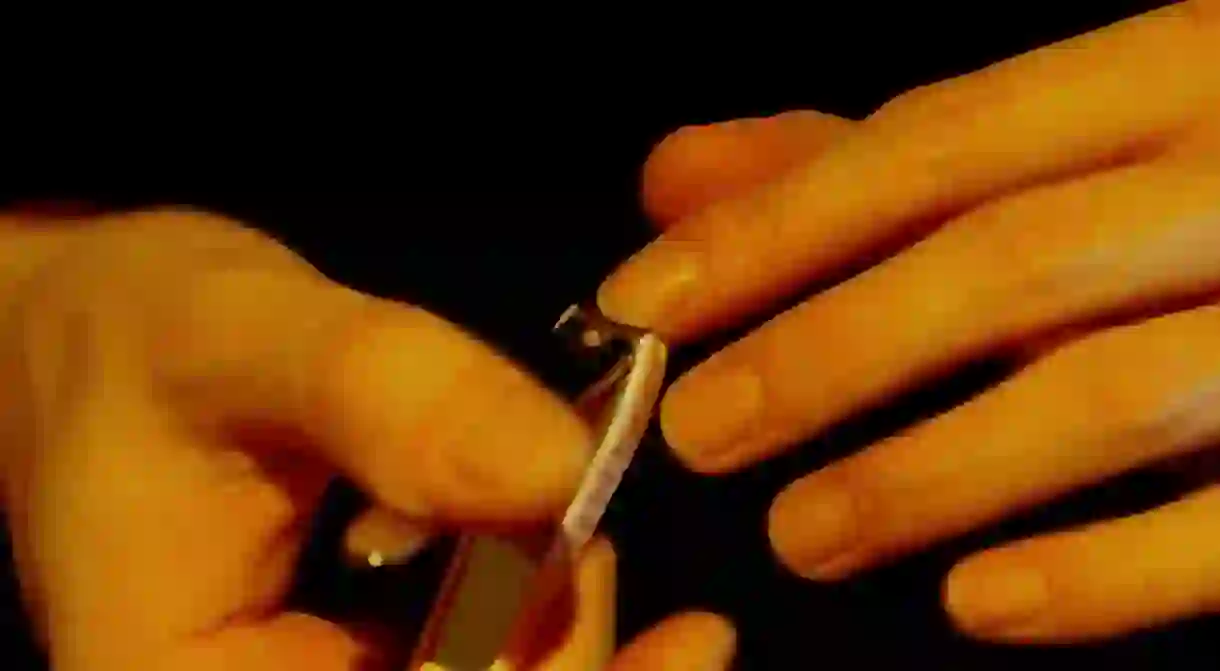 Woman trimming nails