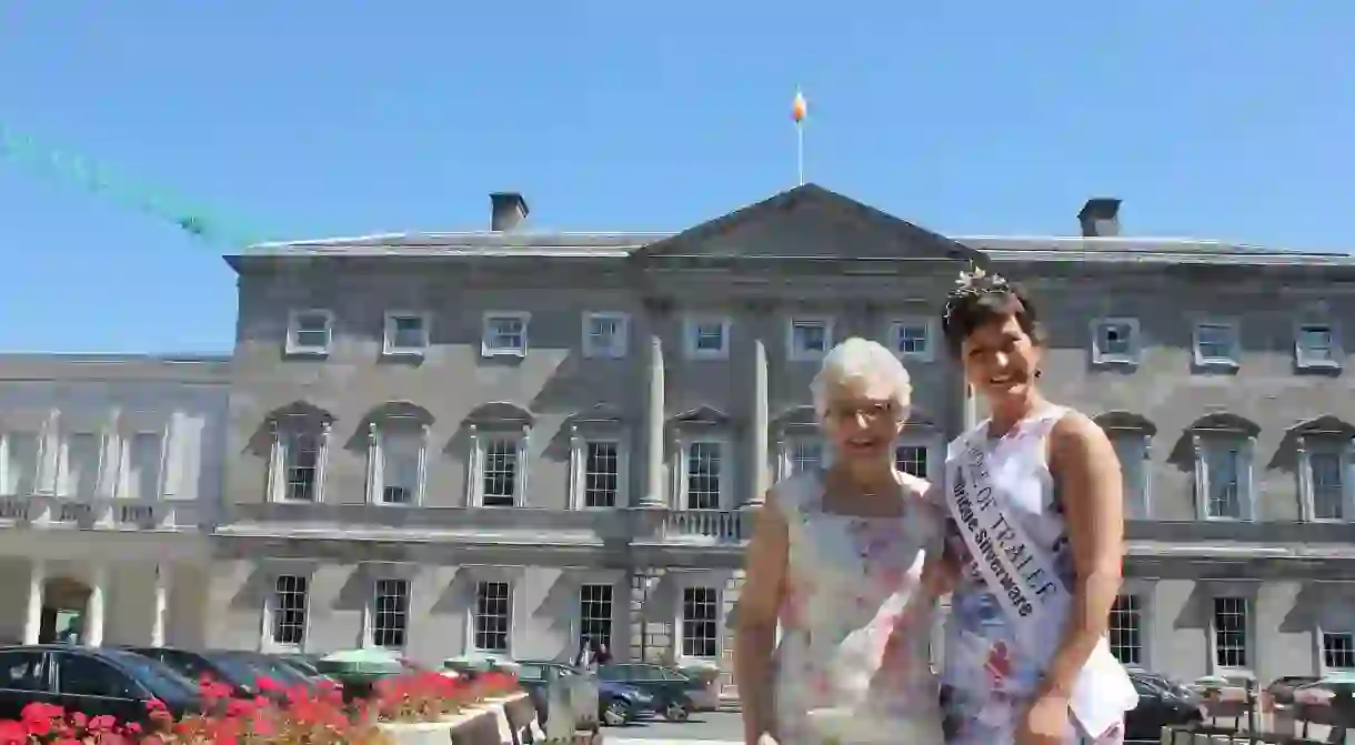 Irish Senator Catherine Zappone outside Irish parliament with Rose of Tralee Maria Walsh