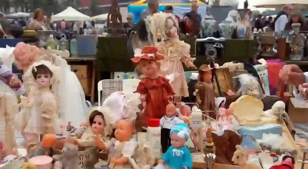 An impressive doll collection for sale on a Bruges flea market