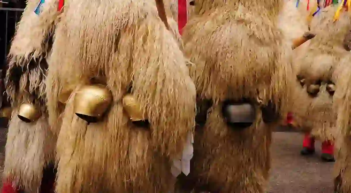 People dressed as Kurent at International Carnival in Ptuj