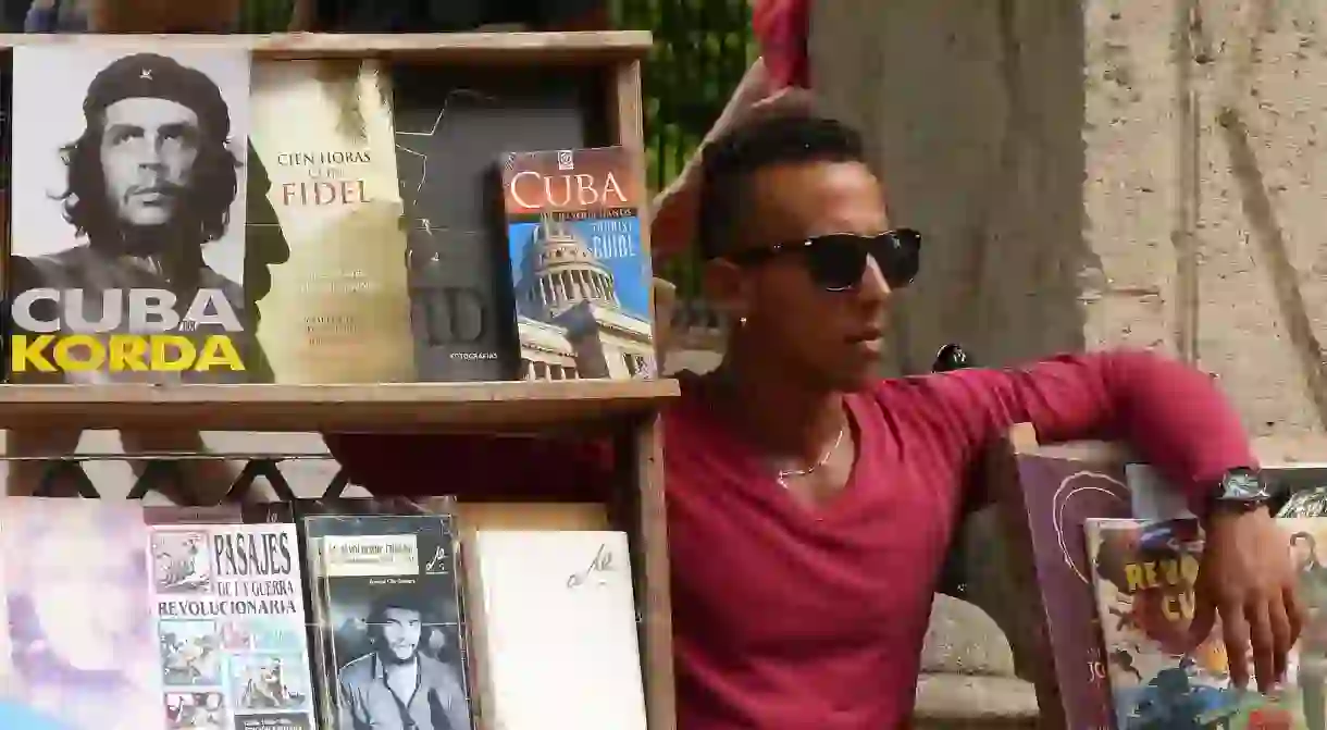 A man sells secondhand books in Cuba