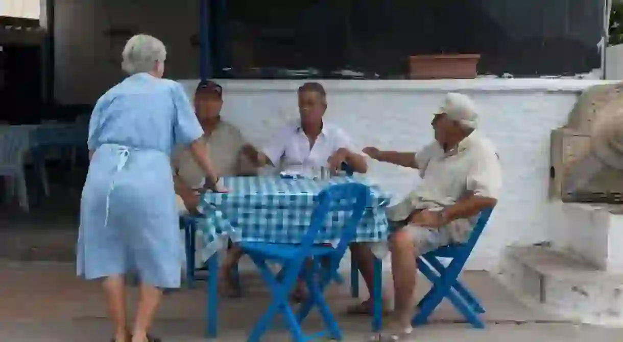 Santorini locals sitting down for lunch