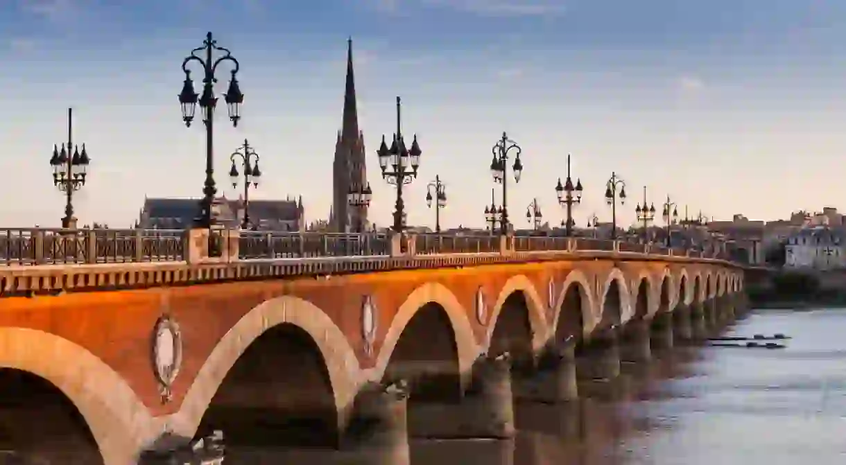 Pont de pierre at sunset in Bordeaux, France