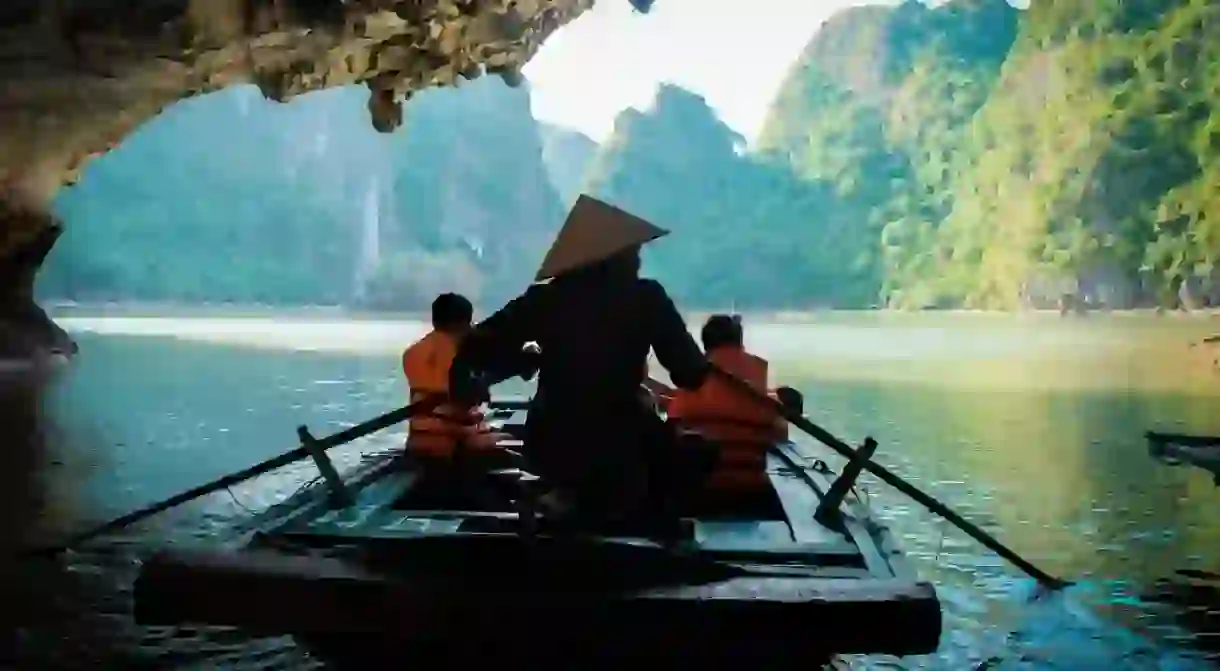 Boating through caves in Vietnam