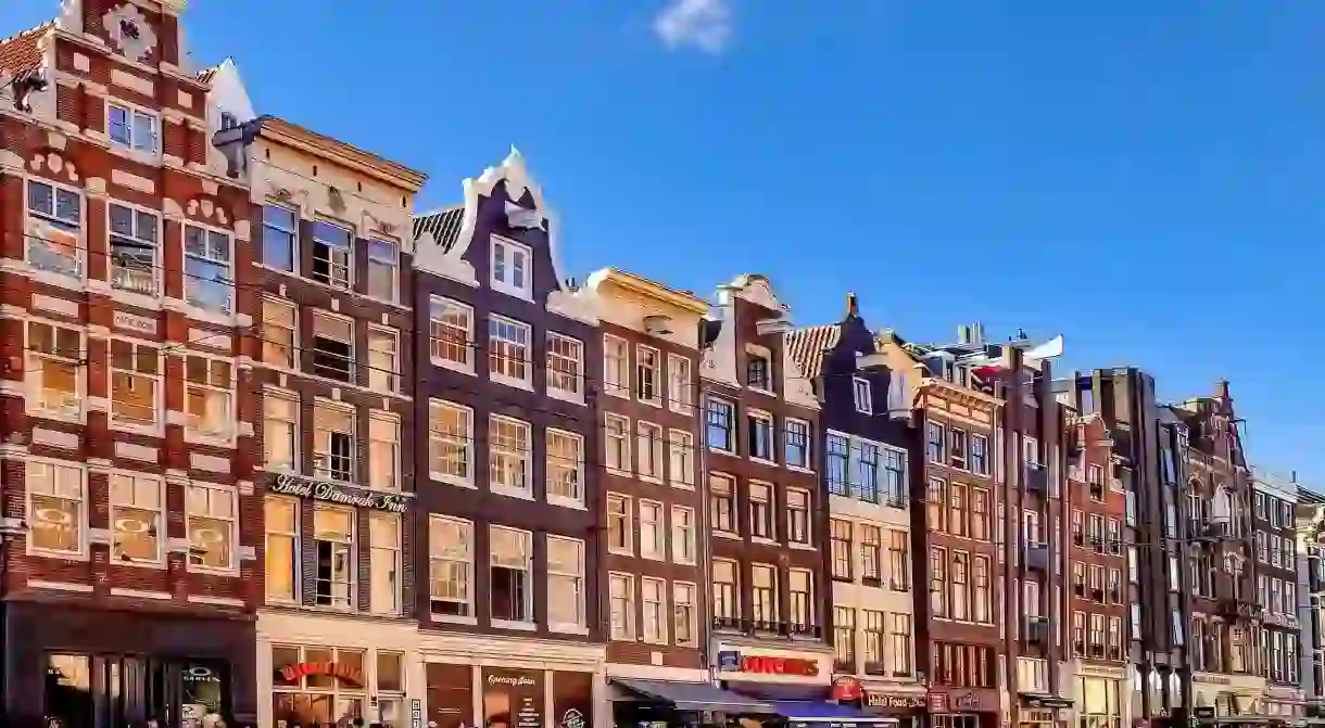 There are dozens of tourist stores on Damrak in Amsterdam