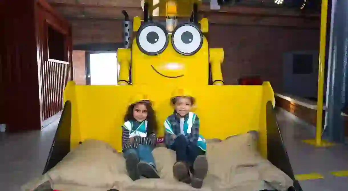 Children on a digger