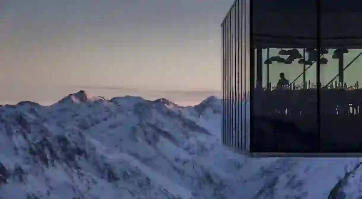 Enjoy dinner with the most staggering view of the Alps