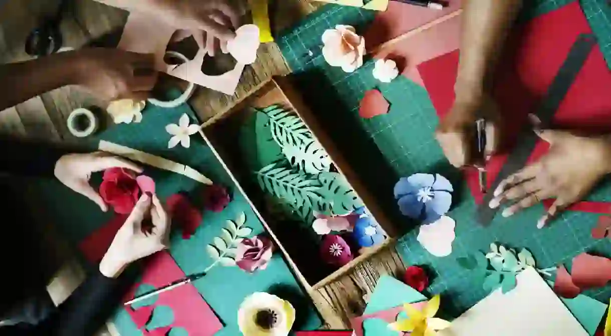 People Making Paper Flowers Craft Art Work Handicraft