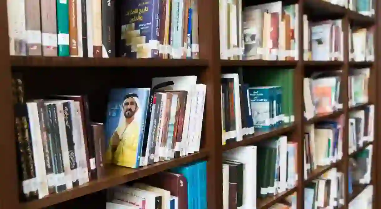 Shelves stacked with Arabic books