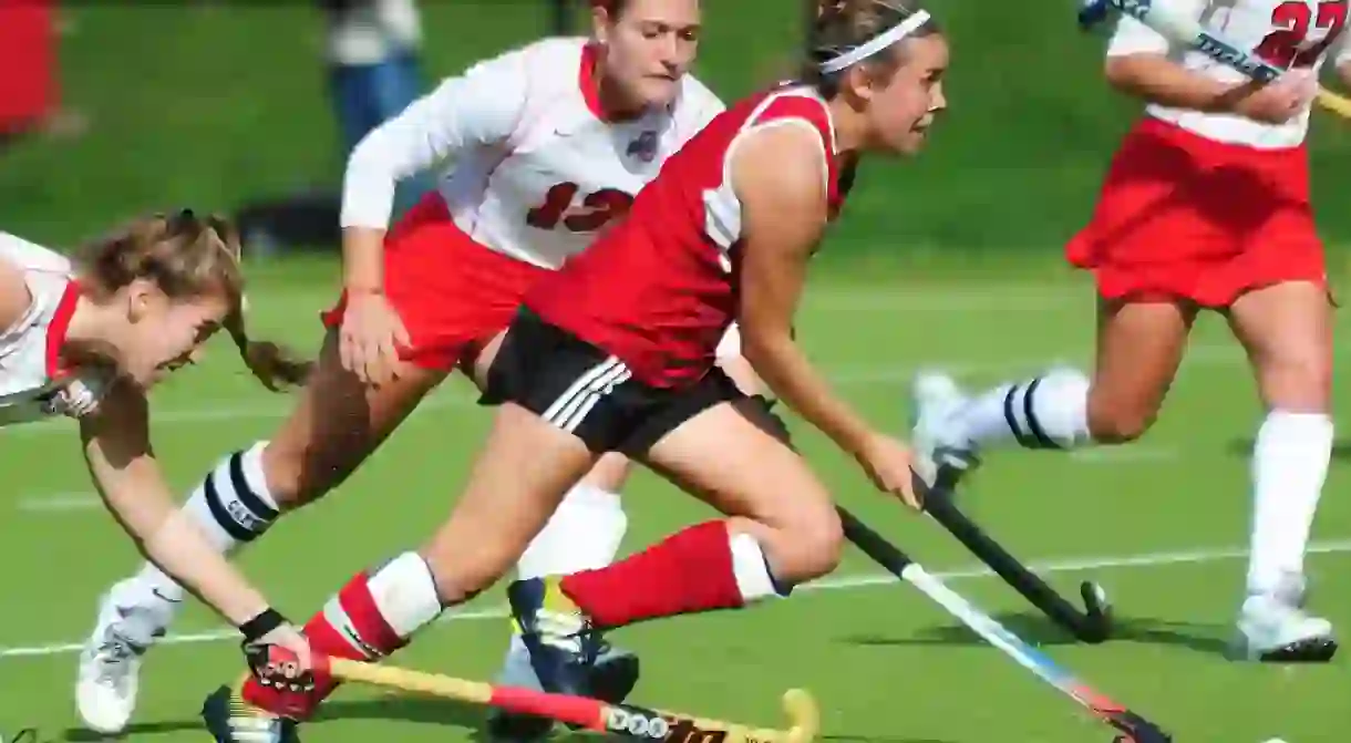 Audra Heilman (center) and two former IU teammates are starting a field hockey club in Indiana