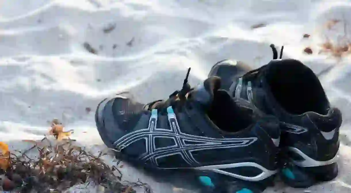 Running shoes on sand