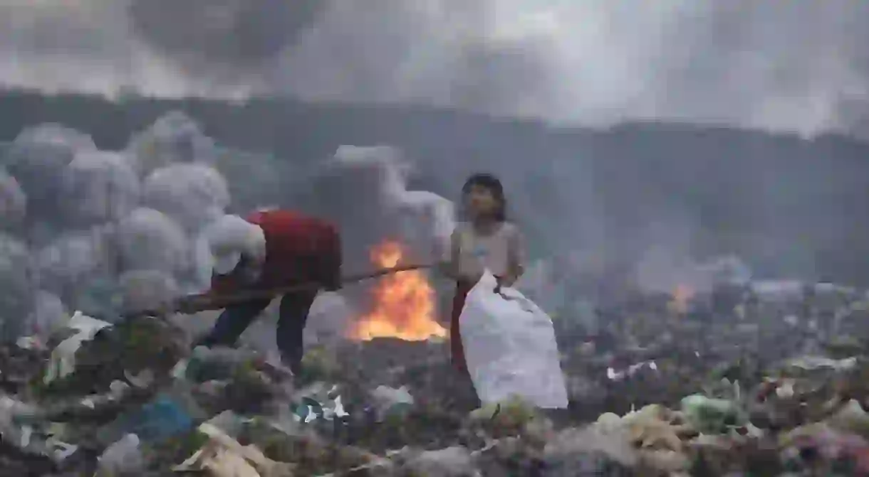 The hopeful eyes of the girl making a living by rubbish