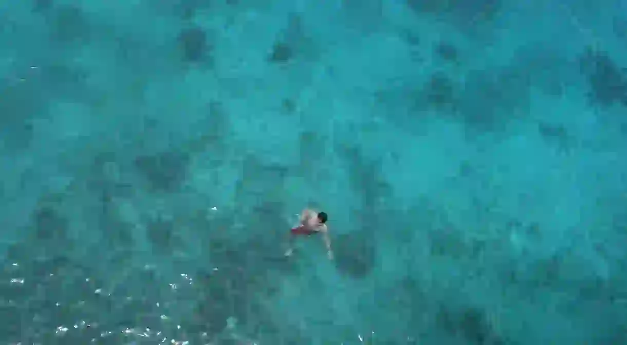 Man in sea, Siquijor, Philippines