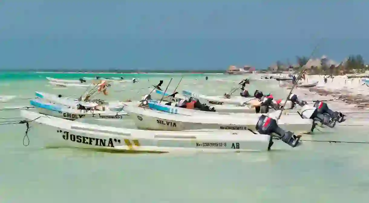 Launches bob in the tide on Isla Holbox