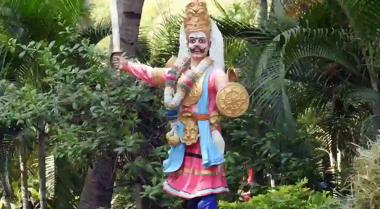 A traditional figure at the entrance of Janapada Loka