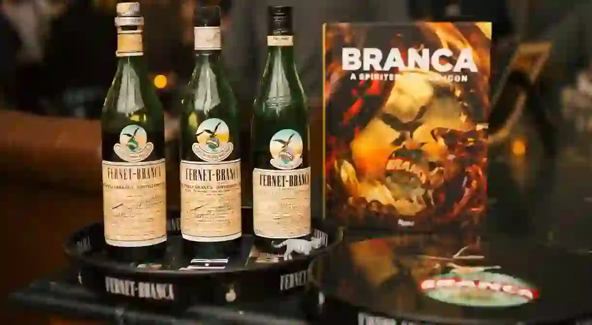 Bottles of Fernet-Branca along with a copy of the brands new book