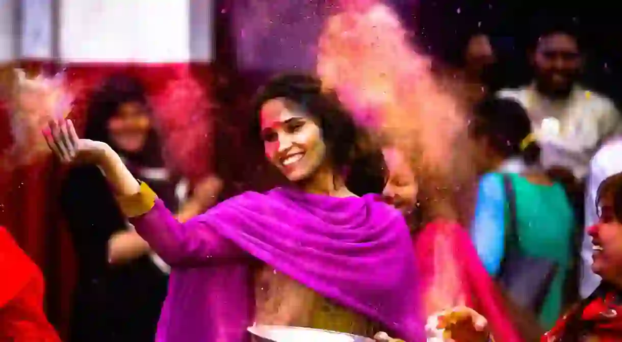 Locals celebrating the Indian festival of colors, Holi