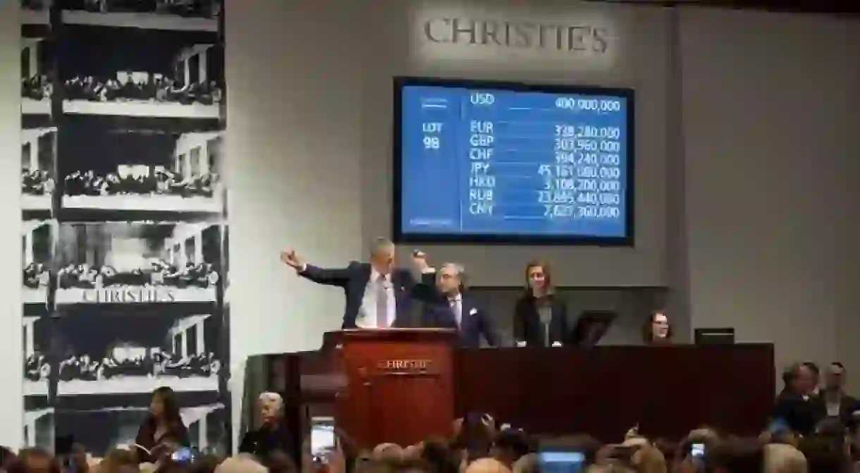 Auctioneer and Global President Jussi Pylkkänen selling Leonardo da Vinci’s Salvator Mundi for a record $450,312,500