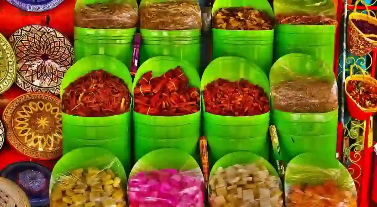 Colourful Moroccan spices, sweets, and ceramics