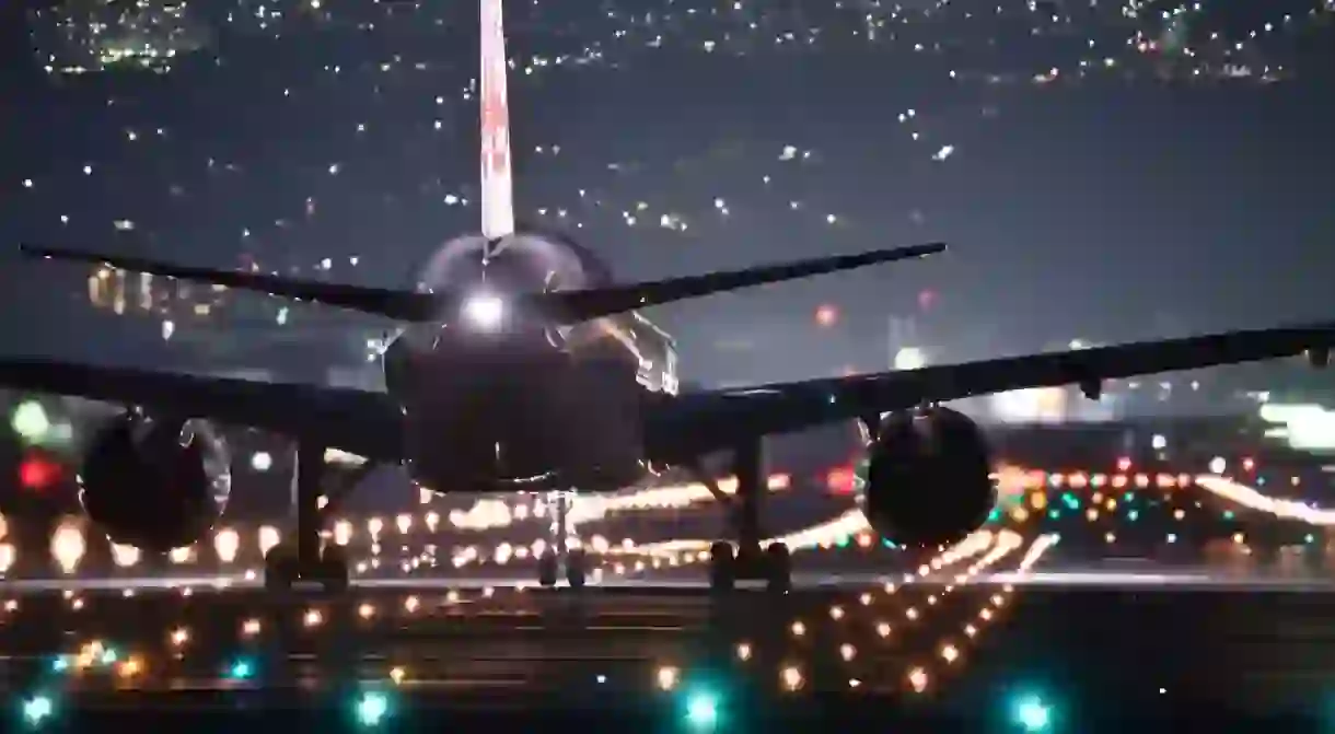 Airplane taking off at night