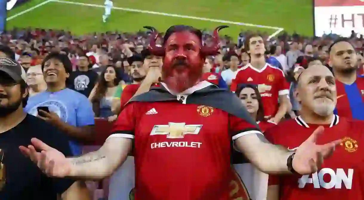 A Manchester United fan watches the clubs International Champions Cup match against Barcelona