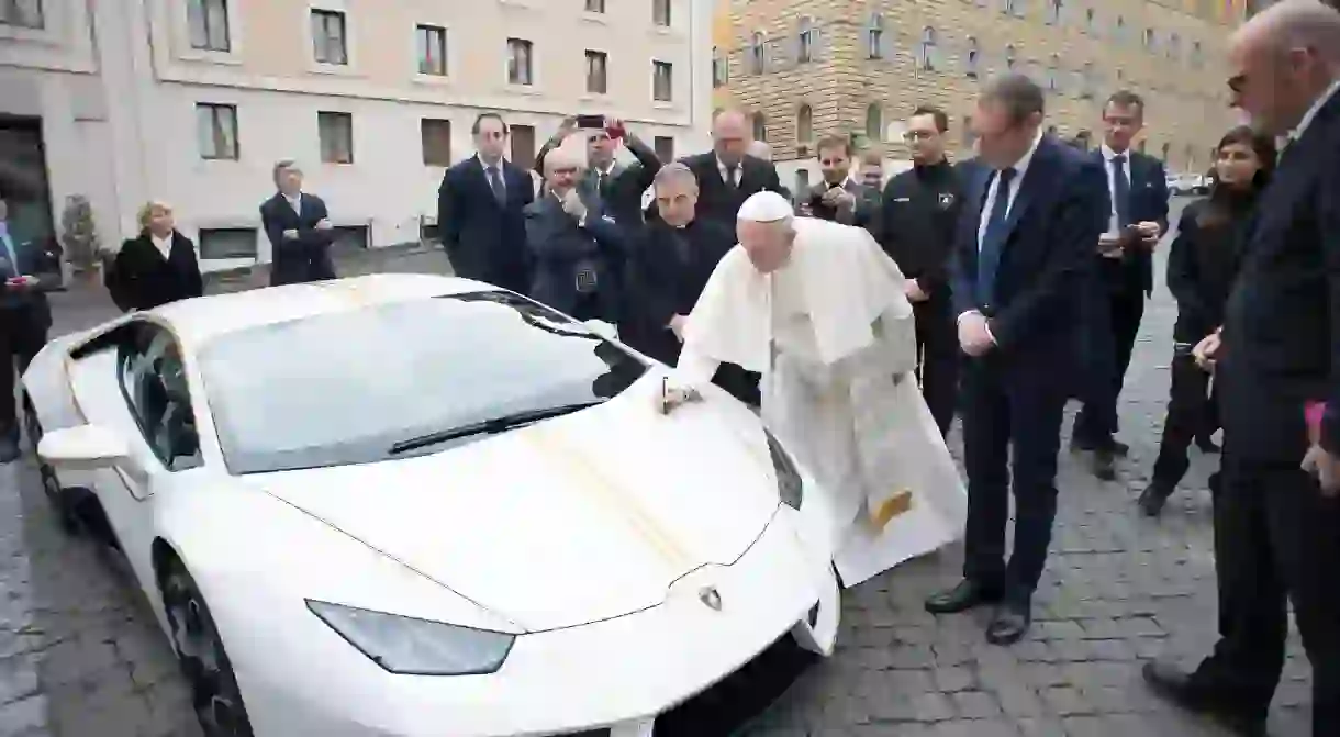 Pope Francis signing the Lamborghini Huracan