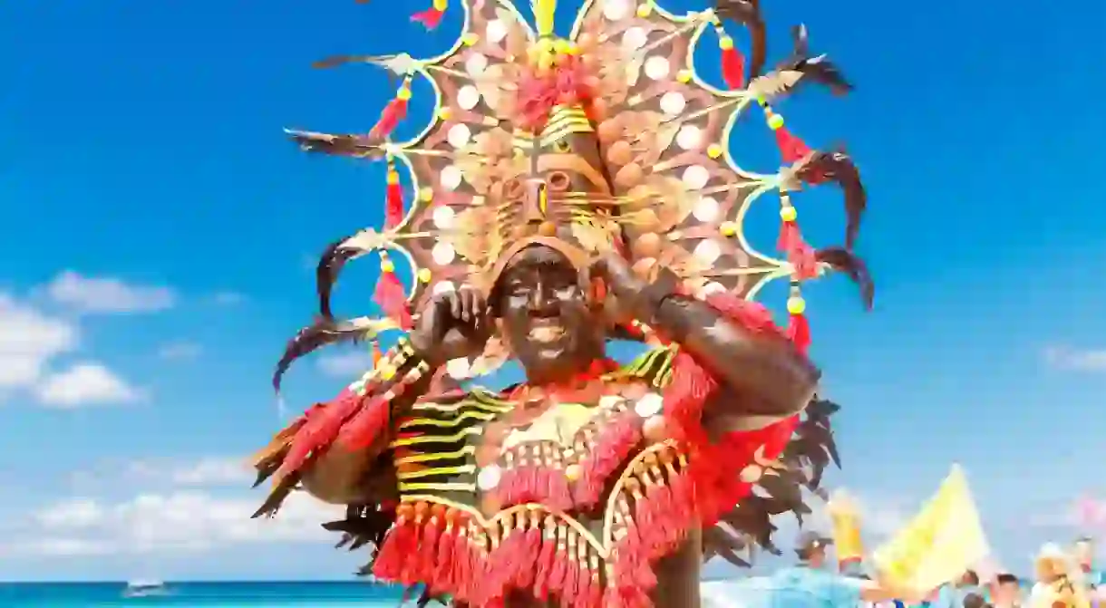 Man in colorful headdress in Ati-Atihan in Boracay