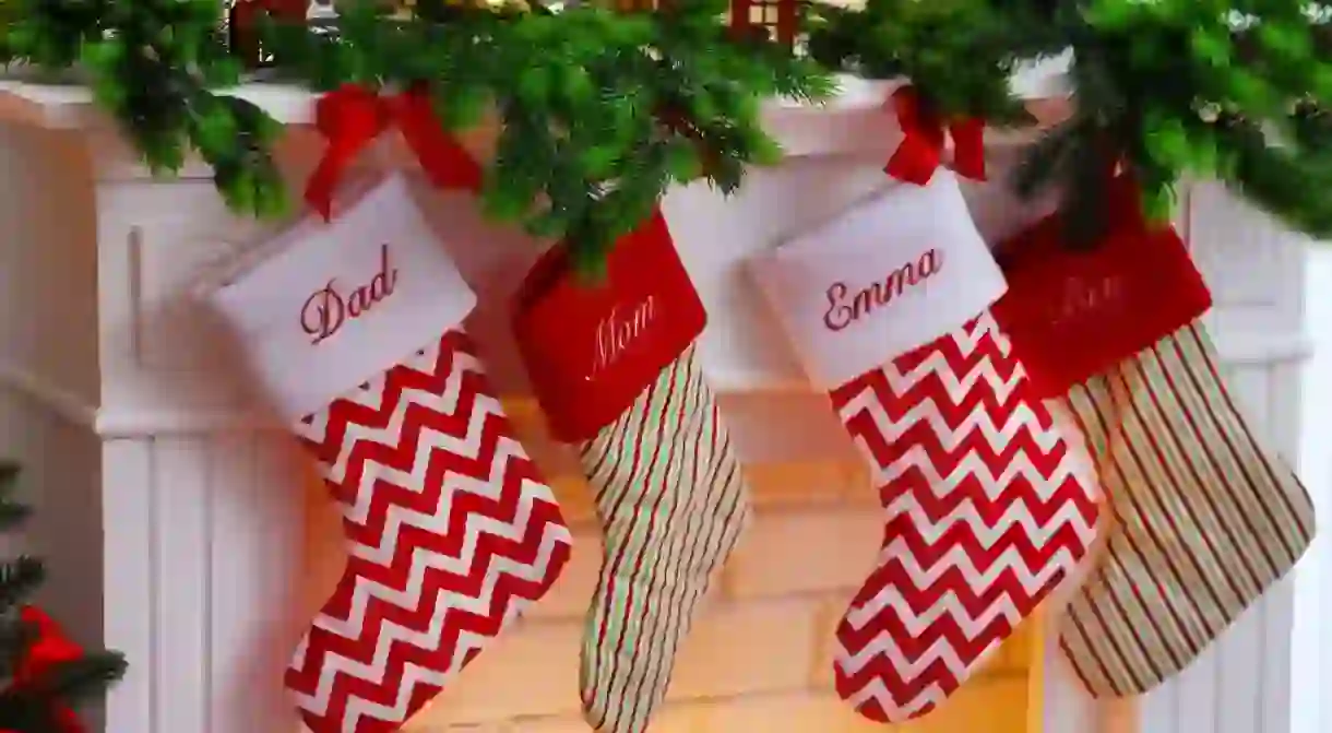 Christmas stockings with family members names emblazoned on them