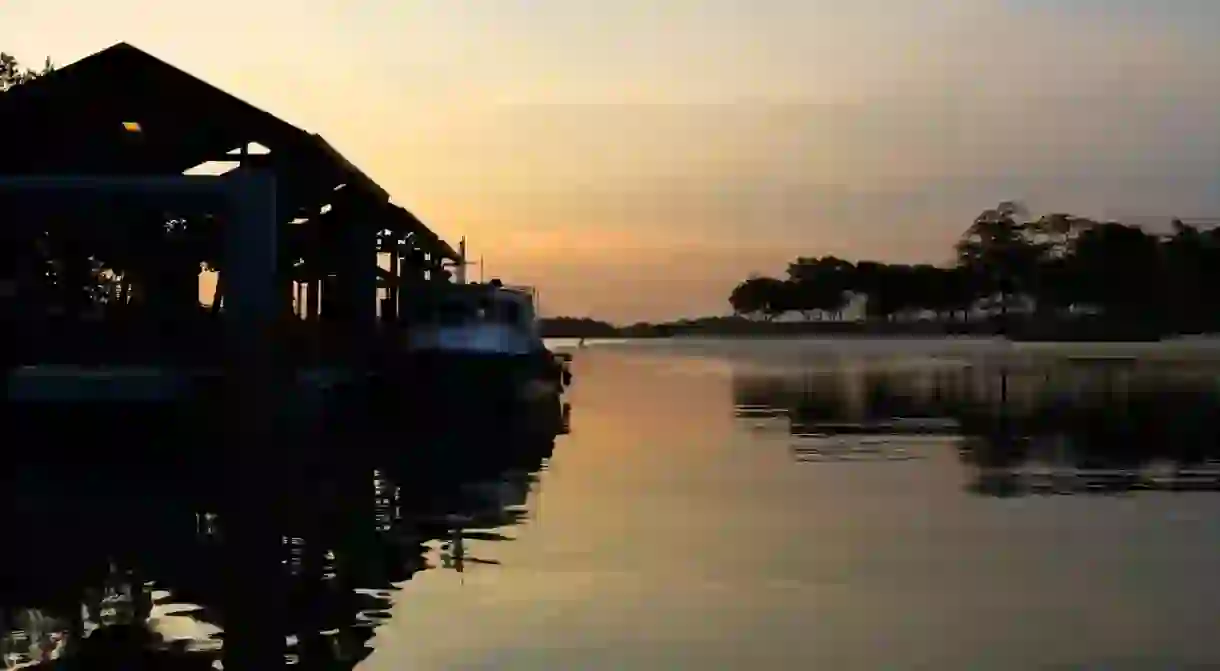 View of the sunset against the ferry terminal in Pulau Ubin