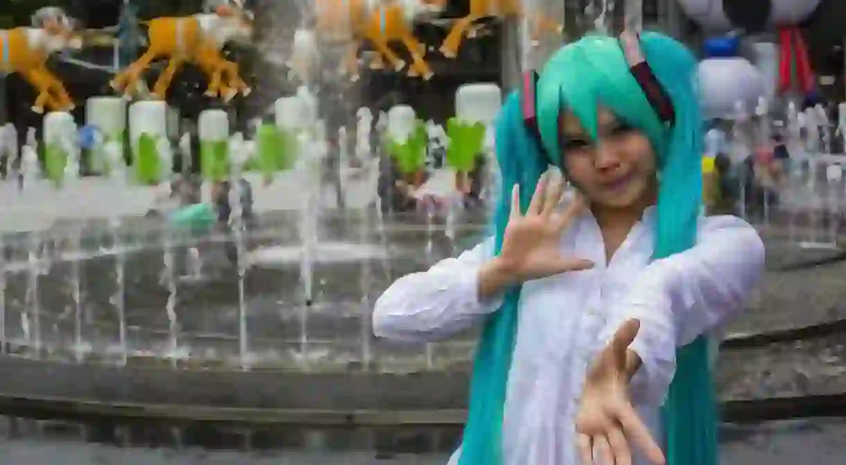 A girl poses in Siam Square, Bangkok