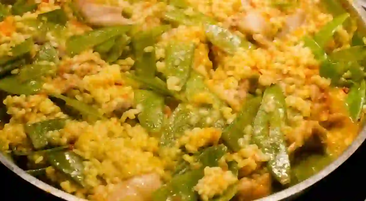 Paella Valenciana with rabbit, chicken and vegetables