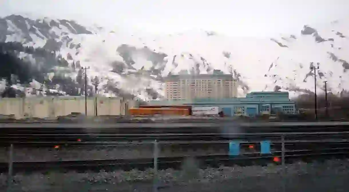 A view of Begich Towers from across the train tracks